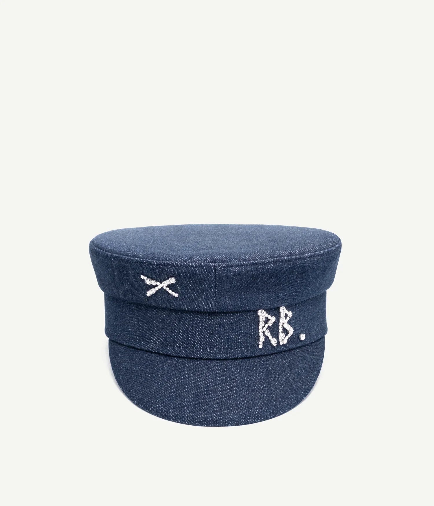 44_10_40, Ruslan Baginskiy Синій Денім Бейкер Бой КепЗнакова модель бренду. Лаконічну форму виробу підкреслює темний синій денім. Завершений ручною вишивкою кристалами монограми RB та хрестика.Створено в Україні.