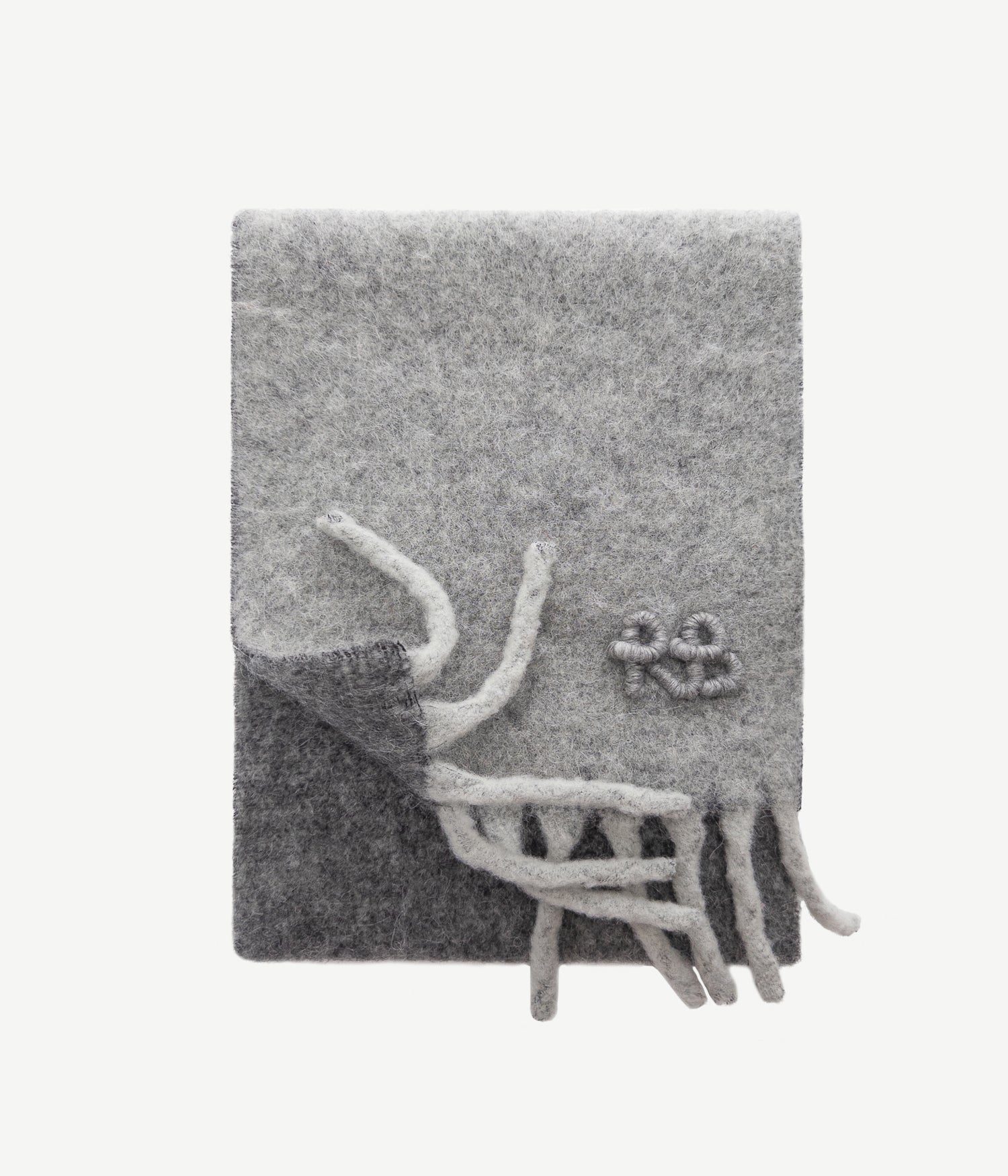 All Knits, Ruslan Baginskiy medium-length scarf is embellished with a contrasting fringe and pastel RB logo. The shades of wintertime nature informed the colour palette, which varies from grey to red. And the heartwarming effect is transferred by the wool, mohair, and alpaca blend.Size MID - 25x195 cm42% Wool, 30% Nylon, 14% Alpaca, 14% Mohair