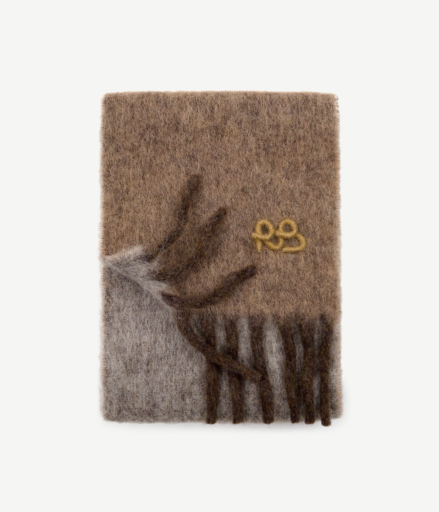 All Knits, Ruslan Baginskiy medium-length scarf is embellished with a contrasting fringe and pastel RB logo. The shades of wintertime nature informed the colour palette, which varies from beige to deep brown. And the heartwarming effect is transferred by the wool, mohair, and alpaca blend.Size MID - 25x195 cm42% Wool, 30% Nylon, 14% Alpaca, 14% Mohair