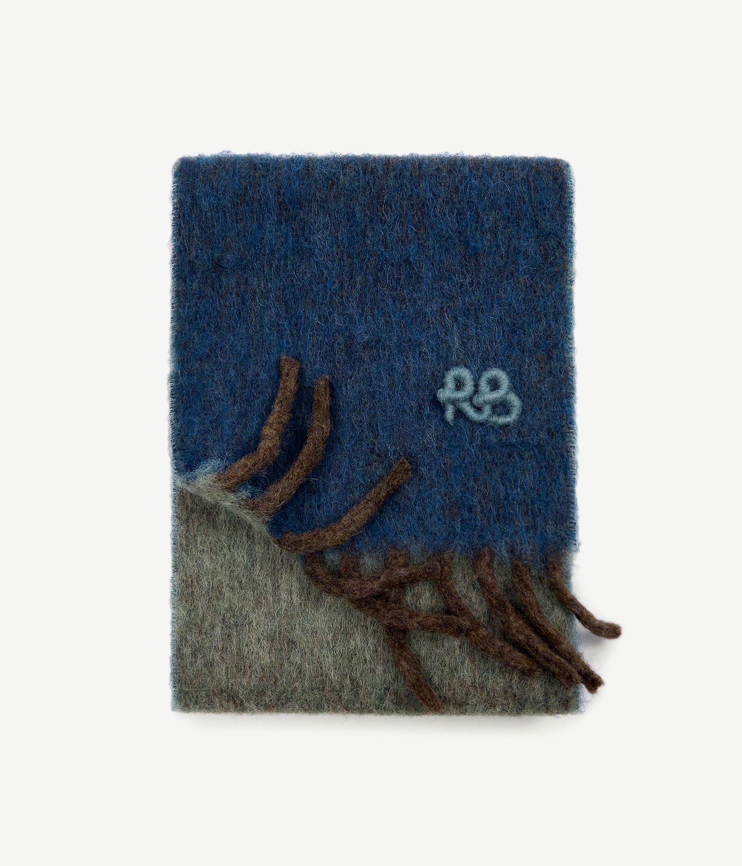 All Knits, Ruslan Baginskiy medium-length scarf is embellished with a contrasting fringe and pastel RB logo. The shades of wintertime nature informed the colour palette, which varies from freezing blue to deep brown. And the heartwarming effect is transferred by the wool, mohair, and alpaca blend.Size MID - 25x195 cm42% Wool, 30% Nylon, 14% Alpaca, 14% Mohair